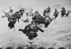 Robert Capa, D-Day, Omaha Beach, June 6, 1944, 1944, Posthumous gelatin silver print, printed under the supervision of Cornell Capa c.