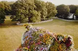 Jürgen Teller, Stephanie Seymour reclining on Jeff Koons' "Puppy", 2000, Chromogenic print on Fujicolor-Professional paper
