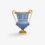 Werner & Mieth, A museum-quality Berlin glass krater-form vase, Powder-blue coloured glass with a matte surface, painted in white, gilt bronze, white marble. Decorated with a frieze of figures in classical attire around an altar. Scroll handles issuing from mascarons. The rim and shaft mounted with metal. A crack below one handle