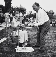 Edward Quinn, Grace Kelly and Alfred Hitchcock take afternoon tea at the set of 'To Catch a Thief', 1954, Gelatin silver print, printed