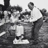 Edward Quinn, Grace Kelly and Alfred Hitchcock take afternoon tea at the set of 'To Catch a Thief', 1954, Gelatin silver print, printed
