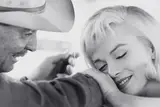 Cornell Capa, Marilyn Monroe and Clark Gable during the filming of 'The Misfits', Nevada
