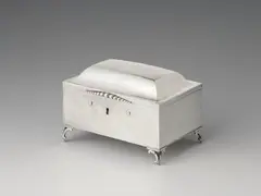 Jean Godet, A Berlin silver sugar box, Cuboid box resting on four feet; the offset hinged lid with a small beaded push-button. Original lock; key missing. H 9; W 13.3; D