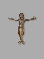 Maasland, A 12th century bronze Corpus Christi, presumably Maas Region, Cast and engraved bronze with old patina. Depicting Christ crucified with four nails with His arms stretched out horizontally, His head turned to one side and in a slightly swaying pose. Minimal wear. Mounted on a velvet covered plaque