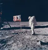 Nasa, Astronaut Edwin E. Aldrin Jr. poses for a photograph beside the deployed United States flag, Apollo 11, 1969, Vintage chromogenic print on Kodak paper