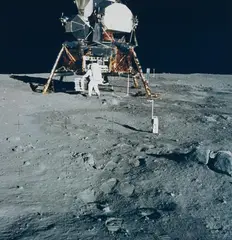Astronaut Edwin E. Aldrin Jr. prepares to deploy the Early Apollo Scientific Experiments Package on the surface of the Moon, Apollo 11 by Nasa, 1969, Vintage chromogenic print on Kodak paper, sold Jun 2023