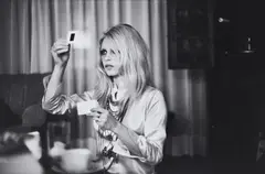 Jacques Héripret, Brigitte Bardot regarde ses Diapos, 1968, Gelatin silver print, printed later