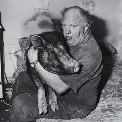 Roger Ballen, Brian with Pet Pig, 1998, Selenium toned gelatin silver print on Ilford-K24 paper