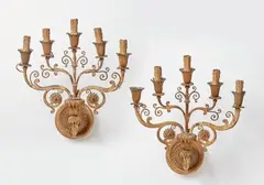 A pair of sconces after a design by Karl Friedrich Schinkel, A pair of sconces after a design by Karl Friedrich Schinkel, Five-flame wall appliques made from bronze-plated and gilded wood chip paste on wooden core, zinc/lead, and iron. The nozzles fitted for electricity, with older wires, two breakages, some localised wear to the gilding, in need of restoration. H c. 40, W c. 40. D