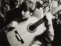 George Harrison with guitar by Astrid Kirchherr, 1960, Gelatin silver print, printed later, offered Dec 2022