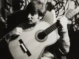 Astrid Kirchherr, George Harrison with guitar, 1960, Gelatin silver print, printed later