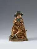Flemish late 15th century, A late 15th century Flemish carved wood figure of Saint Jerome (?), Carved in the round. With partially overpainted older polychromy. A figure of an enthroned older man in priestly attire and a broad brimmed Cardinal's hat designed for a slightly lowered viewpoint. The object originally held in the figure's hands, presumably an attribute, is now lost, but the figure most likely represents the Church Father Saint Jerome. The left hand reattached. The right forearm and the hand replaced. The left foot beneath the robe lost. The left back corner of the plinth replaced. Wear throughout