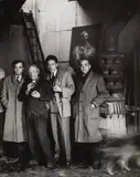 Christian Bérard, Pierre Reverdy, Picasso, Jean Cocteau and Brassaï in Picasso's studio at rue des Grands Augustins, Paris