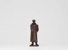 Christian Daniel Rauch, A cast bronze figure of Goethe, Cast bronze with brown shimmering patina. Full-figure depiction of the poet in a buttoned house coat with his hands folded behind his back. Inscribed on the front of the octagonal plinth: "GOETHE 1828". With some stains and a scratch to the forehead. H