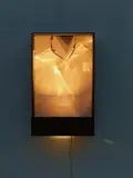 Julio Le Parc, Continuel Luminiere Cylindre, 1966, Kinetic object: Metal band on rotating hook in front of white painted wood in wood and metal box with electric motor