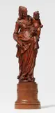 Flemish 17th century, A 17th century Flemish carved boxwood figure of the Virgin and Child, Carved in the round. A depiction of the Virgin standing in a gently swaying pose, designed for a frontal viewpoint. She holds the nude Christ Child, depicted with a globe, over Her left hip and a flowering sprig in Her right hand. This small-format sculpture is characterised by the finely observed drapery of the Virgin's robes. The left side of the plinth reattached. Some vertical hairline cracks