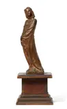 Victor Rousseau, A bronze figure “Tanagra”, Cast bronze with golden brown patina. Depicting a young woman in classical attire standing on a flat square plinth. H