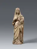 Ibero-Flämisch 15th century, A 15th century Ibero-Flemish carved alabaster figure of the Virgin and Child, Carved in the round. With remains of older, presumably original, polychromy. A depiction of the Virgin standing in a gently swaying pose holding the Christ Child in Her left hand, designed for a slightly lowered viewpoint. This work, although reminiscent of Flemish sculpture, displays artistic peculiarities in the stiff pose of the Child, the thin-waisted body of the Virgin and Her unusual facial features that indicate an origin on the Iberian peninsula. The Virgin's right hand lost. Wear with minor losses