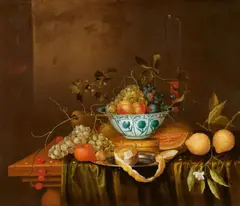 Theodoor Aenvanck, Still Life with Fruit in a Wanli Dish on a Box, a Wine Flute, Silver Plates and Fruit scattered on a Table, Oil on canvas (relined)