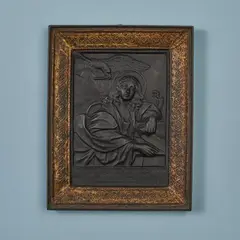 Leonhard Posch, A cast iron plaque with Saint John the Evangelist, Black and bronze tone patinated cast iron. In a separately cast frame. H 15.2, W