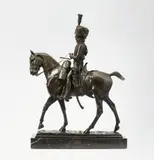 Pierre-Nicolas Tourgueneff, A bronze figure of a hussar on horseback, Finely chased bronze model with slightly shimmering brown patina on a white veined black marble plinth signed “P. Tourgueneff”. Dimensions with plinth H 66.5, L 47, W