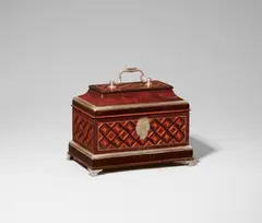 A box with silver-plated mounts by Abraham Roentgen, A box with silver-plated mounts by Abraham Roentgen, Mahogany, cherry, satinwood and ebony veneers on solid cherry and oak with silver-plated bronze, brass and steel mounts. Of rectangular shape with hinged top and handle, protruding base and four curved supports. A finely engraved cartouche-shaped lock plate opens by pushing a button which activates a spring mechanism to reveal the keyhole. The box contains a loose paperweight, a mahogany veneered oak panel with a silver-plated knob handle. The right side of the base contains a shallow secret compartment which can be opened by pushing a hexagonal button placed in the inner right side. The exterior decorated with five panels of rhombus mosaic inlays framed by silver-plated metal stringing. H 19.5, W 25.1, D