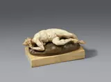 A carved ivory figure of an old woman (Personification of Envy?), by the workshop of the Master of the Furies (presumably active in Salzburg around 1600 - 1625) by studio of Master of the Furies, ivory, carved, boxwood. A small, finely carved ivory and boxwood figure of an old woman lying her back with her limbs co, offered May 2020