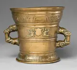 A large Hachmann mortar with hunting dog and rabbit decor by A large Hachmann mortar with hunting dog and rabbit decor, Polished golden yellow cast bronze. One side decorated with winged demi-figures supporting a vacant shield. The rim and , sold May 2020