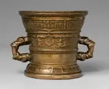 A Hachmann mortar made for Sibert and Elysabet Botliembecher by A Hachmann mortar made for Sibert and Elysabet Botliembecher, Golden brown cast bronze with shimmering natural patina, partially engraved. Both sides decorated with shields held by t, sold May 2020