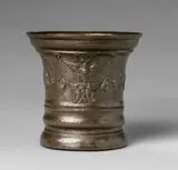 A Grassmayr mortar from 1668, A Grassmayr mortar from 1668, Golden brown cast bronze with silvery shimmering brown patina. The display side decorated with a frieze of dancing grotesques beneath a band of ornament consisting of a cherub's head, putti heads, sage leaves and other leaf motifs. Dated “1668” within the depiction beneath the owner's initials “P W P” in capital letters. With one small handle formed as a dolphin. H 13.7, D