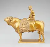 Ignatius Taschner, Allegory of Agriculture, Cast from bronze with high copper content and gilt. Depicting a girl seated on a bull holding a large bunch of grapes and with a bundle of grapes and fruit before her. Engraved to the upper left of the plinth "J. TASCHNER", stamped to the side of the plinth "PRIESSMANN BAUER & CO MUNICH BAVARIA". H