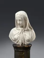 Giovanni Battista Lombardi, A marble bust of a veiled woman by Giovanni Battista Lombardi, Carrara marble, carved in the round. A finely carved depiction of a lady in mourning with a veil pulled far down across her face. The piece is signed and dated to the reverse "GB. Lombardi / Roma. 1870". Several grave sculptures by Giovanni Battista Lombardi exist on the Camposanto of his home town of Brescia. A small black scuff to the reverse, otherwise in pristine condition. Loosely attached to a plinth