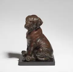 Otto Jarl, A bronze figure of a Labrador puppy, Bronze with fine chocolate brown patina on a black marble base. Cast signature Jarl. Minor chips to the edge of the base. H with base