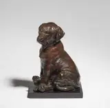 Otto Jarl, A bronze figure of a Labrador puppy, Bronze with fine chocolate brown patina on a black marble base. Cast signature Jarl. Minor chips to the edge of the base. H with base
