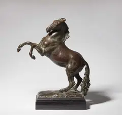 Paul Scheurich, A bronze figure of a rearing horse, Bronze with reddish brown patina and decorative green flecks on a black marble base. Signed to the side of the base SCHEURICH, caster's stamp RICH. BARTH BLN. MARIENDORF. H with base