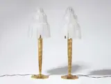 A pair of Marius Ernest Sabino glass "Cascade" table lamps by A pair of Marius Ernest Sabino glass "Cascade" table lamps, Moulded clear glass with matte etching on gilt bronze base with replaced wiring. Signed SABINO 4645 PARIS DÉPOSÉ. H, offered Sep 2019
