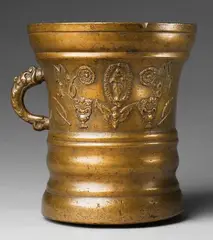 Werkstatt Grassmayr, A large important Grassmayr mortar, Golden yellow bronze with natural patina. Squat, cylindrical vessel with moulded lower section. The centre of the body cast with motifs of the Virgin and Child in an aureola, vases of flowers, winged angel's heads, and sage leaves. With initials "M M" and dated "1687". H 22.2, D
