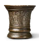 Werkstatt Grassmayr, A dated Grassmayr mortar with casts from nature, Cast bronze with mottled brown patina and remnants of silver plating. Cast with scattered motifs to the body: A bird on a flower, tulips, sage leaves and mascarons flanking the date "1668". With owner's monogram "GPS". One dolphin handle. H 18, D