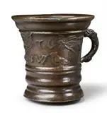 Werkstatt Grassmayr, A dated Grassmayr mortar with insects, Cast bronze with slightly mottled brown patina. With a central winged putto head flanked by insects, birds, and flowerheads and dated "1670" below the initials "C C W". H 13.8, D