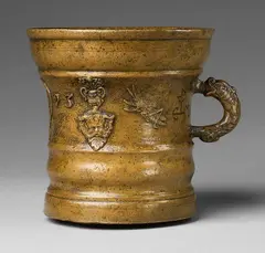 Werkstatt Grassmayr, A dated Grassmayr mortar with grasshoppers and a coin medallion, Cast bronze with slightly mottled pale brown patina. Cast with a series of motifs around the centre of the vessel: Grasshoppers, leaves, vases of flowers, mascarons, and a coin medallion dated "1693". With an engraved owner's cypher beside the dolphin handle. H 15, D