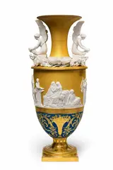 Königliche Porzellanmanufaktur Berlin Kpm, A Berlin KPM porcelain vase with a depiction of the Aldobrandini wedding, the so-called nuptial vase from the service with the iron helmet, Unidentified model fired in two parts. The slender body similar to a lekythos on a short concave shaft supported on a square plinth. The loosely attached trumpet shaped neck decorated with a luscious floral relief and to each side a kneeling winged female genius laying down a wreath. The cylindrical body decorated with a wedding scene in biscuit porcelain on gilt ground with vermicelli décor. The lower section with gilt arabesques and baskets of fruit on matte blue ground. The interior with a biscuit porcelain rosette relief designed to imitate bronze mountings surrounding five firing holes. Blue sceptre with red dash, incised 54 and 4. H