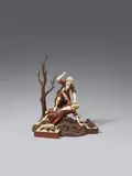 studio of Simon Troger, A carved boxwood and ivory group of Cain killing Abel, from the studio of Simon Troger, Boxwood and ivory sculpture pieced together from several parts, carved in the round, glass eyes. Depicting the two brothers grappling with each other beside a tall leafless tree on an earth mound base. The work captures the most dramatic moment of the story in which Cain strikes his brother dead as he lies prostrate on the ground. Two protrusions to the back of the plinth show the two altars with Abel's sacrificial lamb and his brother's gift of wheat. The work is monogrammed "M.K.B" to the front left. The weapon in Cain's right hand lacking. The outer left branch loosely attached