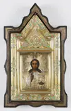 Ikone mit der Darstellung des Christus Pantokrator by Russia Moskau, Anfang 20. Jahrhundert, Tempera auf Holz, getriebenes und teils vergoldetes Silberoklad, rückseitig mit orangebraunem Samt bezogen, sold Sep 2018