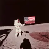 Nasa, Astronaut Alan B. Shepard standing with American flag on lunar surface, Apollo 14