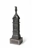 Heinrich Zumpft, A cast iron model of the Igel Column, Black patinated iron on a black marble base. A model of the ancient Roman grave stele near Trier. With a plaque to the front of the base "RÖMISCHES DENKMAL IN IGEL", and a further commemorative plaque to the reverse "Herrn Director O. Lenz zum 25 jähr. Dienstjubiläum. Die mittelrheinischen Hüttenwerke." Unmarked. H