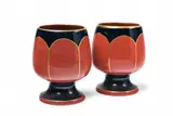 Cadinen & Kadyny, A pair of Cadinen maiolica beakers, Red terracotta beakers painted in cobalt blue and gilded. Stamped mark, impressed 537, painter's mark. H