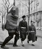 Robert Doisneau, Ségrégation. Dimanche. Inauguration, 1960s, 3 vintage ferrotyped gelatin silver prints. Each approx