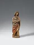 A South German carved wooden figure of Saint John, circa 1500/1510 by South German circa 1500 & 1510, A finely carved depiction of the saint standing in contrapposto and facing slightly to the right. Saint John, the favour, sold Nov 2017