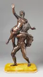A large bronze group after Giambologna by called Giambologna Giovanni di Bologna, With fine golden brown patina, on a yellow Giallo di Siena marble base. Depicting the rape of a Sabine woman. A large ch, offered Nov 2017