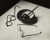 Mondrian's glasses and pipe by André Kertész, 1926, Gelatin silver print, printed later, offered May 2017